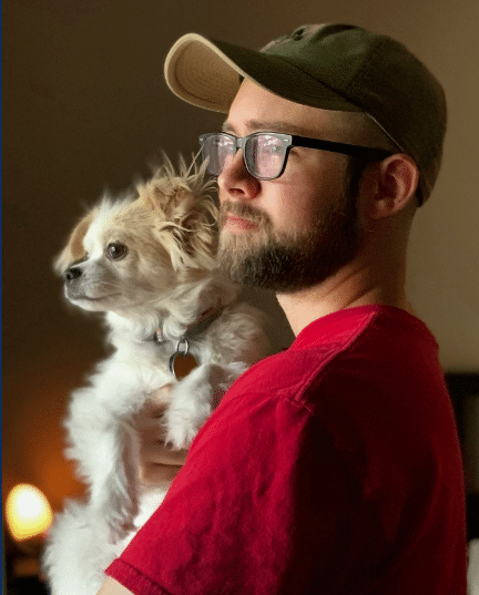 Dakota Wright and dog, Rhymetec Cybersecurity Analyst